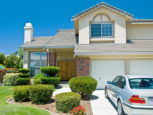 a car parked in front of a home